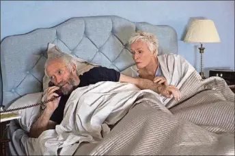  ?? PHOTO COURTESY OF GRAEME HUNTER PICTURES-SONY PICTURES CLASSICS ?? Glenn Close (right) and Jonathan Pryce star in “The Wife.”
