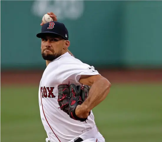  ?? STuART CAHiLL / HeRALd sTAFF ?? GREAT STUFF: Nathan Eovaldi showed great command last night, throwing six strong innings in the Sox’ Opening Day win.