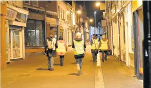  ??  ?? Pictured are volunteers and council staff counting the amount of rough sleepers in spots around Charnwood.