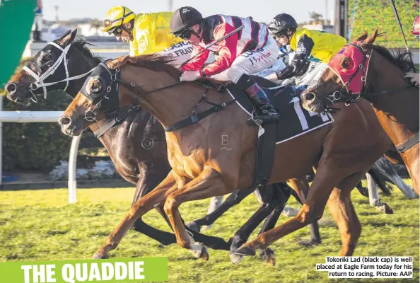  ??  ?? Tokoriki Lad (black cap) is well placed at Eagle Farm today for his return to racing. Picture: AAP