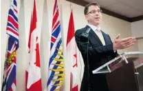  ?? DARRYL DYCK/ THE CANADIAN PRESS ?? ‘ I take full responsibi­lity for this defeat,’ says B. C. NDP leader Adrian Dix, speaking to the media on Wednesday for the first time since his party was defeated.
