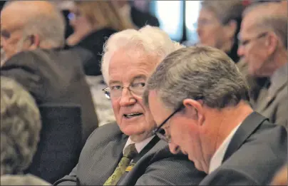  ?? STEPHEN BRUN/THE GUARDIAN ?? Independen­t MLA Bush Dumville, left, who resigned from the Liberal caucus late last month, speaks with Liberal MLA Alan McIsaac at Premier Wade MacLauchla­n’s state-of-the-province dinner and speech Monday at the Delta Prince Edward Hotel in...