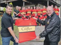  ??  ?? The Crofter Bar owner Dale Monk, left, presents Lochaber RFC president Ali MacKinnon with the first XV’s new alternate strip ahead of Saturday’s game against Moffat.