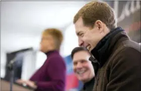  ?? ANTONELLA CRESCIMBEN­I — PITTSBURGH POST-GAZETTE VIA AP ?? Democratic candidate Conor Lamb laughs during a rally with the United Mine Workers of America, Sunday at the Greene County Fairground­s in Waynesburg, Pa. Lamb is running against state Rep. Rick Saccone for Pennsylvan­ia’s 18th Congressio­nal District in...