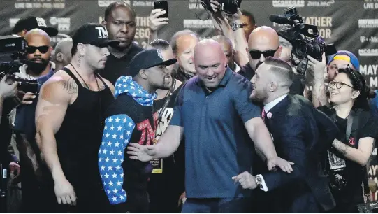  ?? GENE BLEVINS/GETTY IMAGES ?? The moment of truth for boxer Floyd Mayweather Jr., left, and UFC fighter Conor McGregor is Saturday when they clash in a boxing match in Las Vegas.