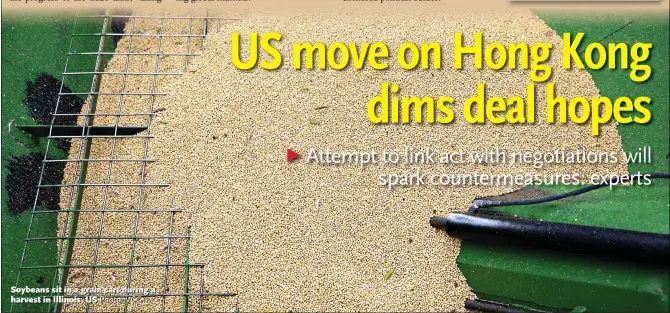  ?? Photo: VCG ?? Soybeans sit in a grain cart during a harvest in Illinois, US