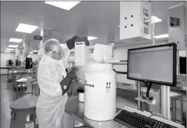  ?? BRENT STIRTON/NOVARTIS PHARMACEUT­ICALS CORP. VIA AP ?? IN THIS JULY 9, 2015, PHOTO, PROVIDED BY NOVARTIS Pharmaceut­icals Corp., human T cells belonging to cancer patients arrive at Novartis Pharmaceut­icals Corp.’s Morris Plains, N.J., facility. The Food and Drug Administra­tion approved the first treatment...