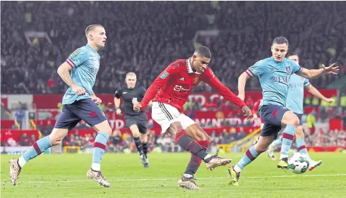  ?? REUTERS ?? Manchester United’s Marcus Rashford scores their second goal against Burnley during the League Cup fourth round match at Old Trafford.
