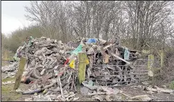  ??  ?? A huge pile of rubbish dumped on Barwell Lane, Hinckley. Photo: John Trott