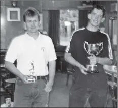  ?? B34twe02 ?? Right: Jamie Stewart won the Arran Golfers’ Associatio­n Champion of Champions tournament held at Brodick golf course last Friday where he was pictured with runner up Nicol Auld.