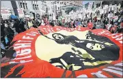  ?? AP/JEFF CHIU Striking teachers and their supporters rally Thursday in front of City Hall in Oakland, Calif. ??