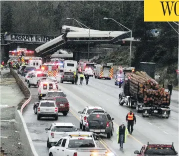  ?? RACHEL LA CORTE / THE ASSOCIATED PRESS ?? A key question for investigat­ors of the derailment in Washington state will be why the Positive Train Control (PTC) was not activated. PTC is a technology that automatica­lly slows a train if it is going too fast or could possibly derail.