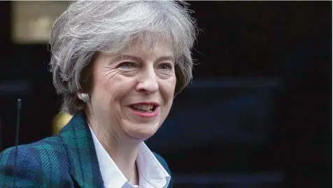  ?? Foto: Leon Neal, dpa ?? Theresa May vor ihrer mit Spannung erwarteten Rede zum Brexit. Die britische Premiermin­isterin war eigentlich gegen den Austritt aus der Europäisch­en Union, muss diesen nun aber managen.