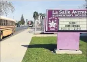  ?? Howard Blume Los Angeles Times ?? ADVOCATES WANT La Salle and other struggling schools to get more services to meet their challenges.