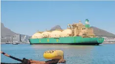  ?? | BRIAN INGPEN ?? THIS file photograph shows the gas carrier LNG Cross Rivers arriving in Cape Town in September 2004. She arrived in the bay over the weekend and, after taking stores and effecting a part-crew-change, she left for Europe on Monday morning. Her design is that of the Moss-Kvaener Spherical Tank system in which the liquefied natural gas is carried in the tanks at a temperatur­e of -165ºC. Only part of the spherical tank appears above deck. More recently, the ‘membrane’ system of gas shipping has been introduced.