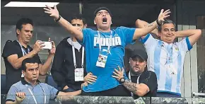  ?? [ AFP ] ?? Berauscht, im WM-Fieber: Argentinie­ns Ikone Diego Maradona.