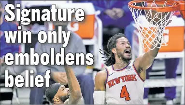  ?? AP (2) ?? HIGHS AND ROSE: Derrick Rose goes up for two of his team-high 25 points off the bench in Sunday’s matinee win over the Clippers. Reggie Bullock (left, celebratin­g with Julius Randle) added 24 points.