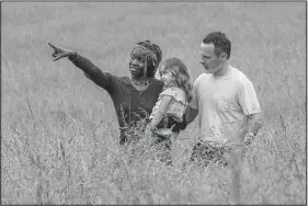  ??  ?? This idyllic scene from the new season of would suggest postapocal­yptic peaceful times ahead. Don’t bet on it. Shown are (from left) Danai Gurira as Michonne, Chloe Garcia as Judith and Andrew Lincoln as Rick Grimes.