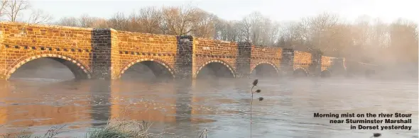  ??  ?? CAPTION: Is in 8.5pt helvetica bold except when it’s on a picture when its helevetica Morning mist on the river Stour near Sturminste­r Marshall in Dorset yesterday