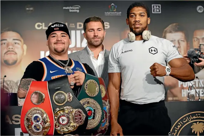  ?? GETTY IMAGES ?? MexicanAme­rican boxer Andy Ruiz Jr, left, with fight promoter Eddie Hearn and British star Anthony Joshua in Saudi Arabia this week.