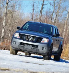  ?? JUSTIN PRITCHARD ?? Nissan Frontier owners appreciate­d a distinctiv­e and flexible cabin, good build quality, a solid and planted feel, power to spare from the big V6 and lots of offroad capability when properly equipped.