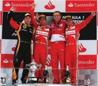  ??  ?? HAPPIER TIMES: STANDING VICTORIOUS WITH RACE WINNER ALONSO AT THE 2013 SPANISH GP. THIS WOULD BE DOMENICALI’S LAST PODIUM APPEARANCE