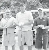  ??  ?? Stan Johnson (left), Bo Reynolds and Tyler Pattat took home second place in the first flight.