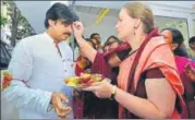  ?? HT ?? Actor Pawan Kalyan’s wife applies vermillion on his forehead before the star’s fourday Telangana tour on Monday.