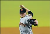  ?? DAVID J. PHILLIP — THE ASSOCIATED PRESS, FILE ?? The Giants’ Logan Webb throws against the Astros during the first inning of an Aug. 10 game in Houston.