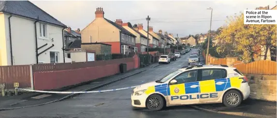  ??  ?? Police at the scene in Ripon Avenue, Fartown