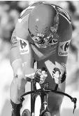  ??  ?? Christophe­r Froome sprints to win the 16th stage of the 72nd edition of “La Vuelta” Tour of Spain cycling race, a 40.2 km individual time trial from Circuito de Navarra in Los Arcos to Logrono in this Sept 5 file photo. — AFP photo