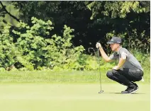  ?? MINAS PANAGIOTAK­IS/GETTY IMAGES ?? Mackenzie Hughes, seen lining up a putt at the RBC Canadian Open on Saturday, had a final round 68.