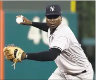  ?? Matt Slocum / Associated Press ?? The Yankees’ Didi Gregorius needs Tommy John surgery on his right elbow after injuring himself making a throw in Boston during the AL Division Series, and there’s no telling exactly when he’ll be able to play again.