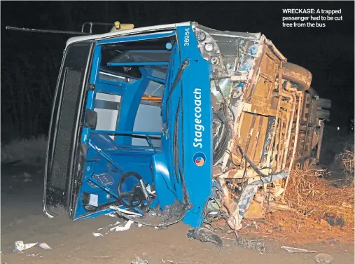  ??  ?? WRECKAGE: A trapped passenger had to be cut free from the bus