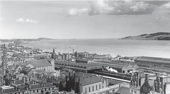  ?? Picture: University of Dundee Archive Services. ?? A view over Dundee rooftops in 1961. Read more about the photograph in the top left-hand column.