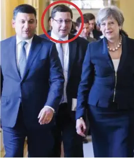  ??  ?? Talks: Mr Yezhov, circled, with his boss and British PM Mrs May