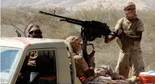  ?? AFP/File ?? Loyalist Yemeni fighters close in on a suspected location of a leader of the terrorist group Al-Qaeda in the Arabian Peninsula leader during their offensive in the Mesini Valley in Hadramawt in this Feb. 21, 2018 photo.