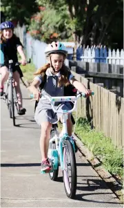  ??  ?? Nakita Marriott rides to school during the Active Path launch at Warragul Primary School.