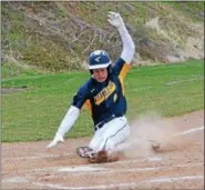  ?? THOMAS NASH - DIGITAL FIRST MEDIA ?? Pope John Paul II’s Ryan O’Neill slides into home safe on an error during the fifth inning of Monday’s game.