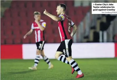  ?? Tom Sandberg/PPAUK ?? Exeter City’s Jake Taylor celebrates his goal against Crawley