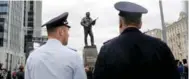  ?? MAXIM ZMEYEV/AFP/GETTY IMAGES ?? A monument to Russian firearm designer Mikhail Kalashniko­v was unveiled in Moscow.