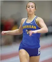  ?? ARKANSAS DEMOCRAT-GAZETTE FILE PHOTO ?? Carly Strong of Sheridan comes into the finish in the 400 meter during the 5A/6A State Indoor Track and Field Championsh­ips in Fayettevil­le.