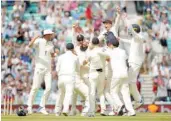  ?? — Reuters ?? England’s Moeen Ali celebrates the wicket of South Africa’s Morne Morkel and to win the third Test with team-mates in London.