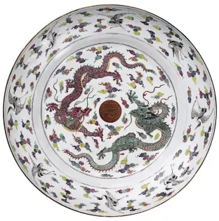  ??  ?? 1. ‘Dragon’ dish, Yongzheng period (1723–35), China, famille rose porcelain, diam. 54cm. Sotheby’s London (£260,000–£360,000)