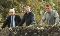  ??  ?? Cllr Joe Sullivan, Donal O’Shaughness­y and John Kavanagh on Ahare Bridge last Friday.