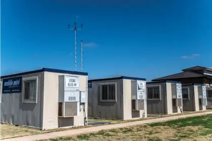  ??  ?? The Biden administra­tion has reopened an influx care facility at Carrizo Springs, Texas, to process migrant children. Photograph: Sergio Flores/The Washington Post/Getty Images