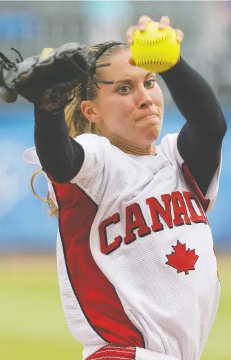  ?? OMAR TORRES/AFP/GETTY IMAGES FILES ?? Trail native Lauren Bay Regula pitches against Australia during the 2008 Beijing Olympic Games. Now a mother of three, she feels Canada's team has a great shot at the Tokyo Games.