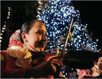  ?? Express-news file photo ?? Mariachi music will follow the lighting of the H-E-B Christmas tree at Travis Park.