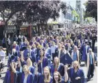  ?? PHOTO: GERARD O’BRIEN ?? Otago Polytechni­c graduands march along George St to their graduation last year.