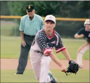  ?? Photo by Keith Reigel ?? Shane Ackley follows through in the Legion baseball game against Smethport. Smethport defeated Kane 16-0 to move into the Elk/mckean finals to play Wilcox.